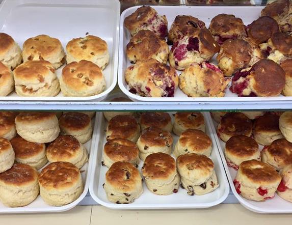 Trays of different flavoured scones