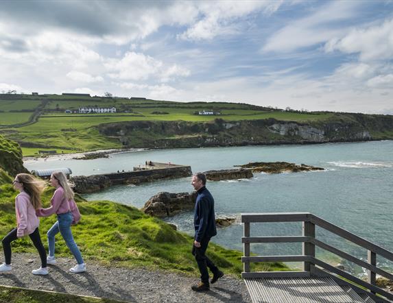 Family walking around Portmuck Harbour