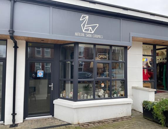 Black and white exterior premises of Natasha Swan Ceramics with window display