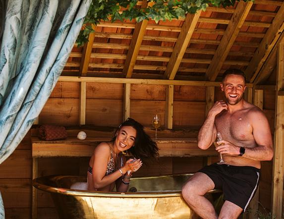 Copper bath located on the terrace outside Shepherd's Hut.