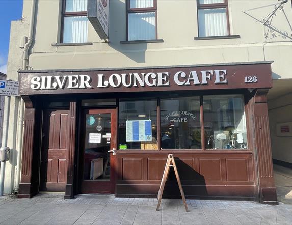 Brown panelled exterior of Silver Lounce Cafe in Larne