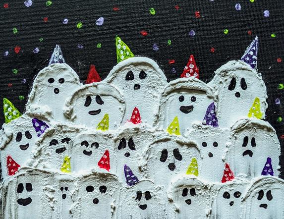 art canvas with 3 rows of ghosts painted on it.