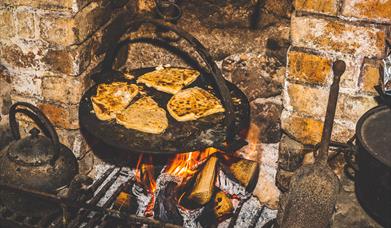 Soda on the griddle over and open fire