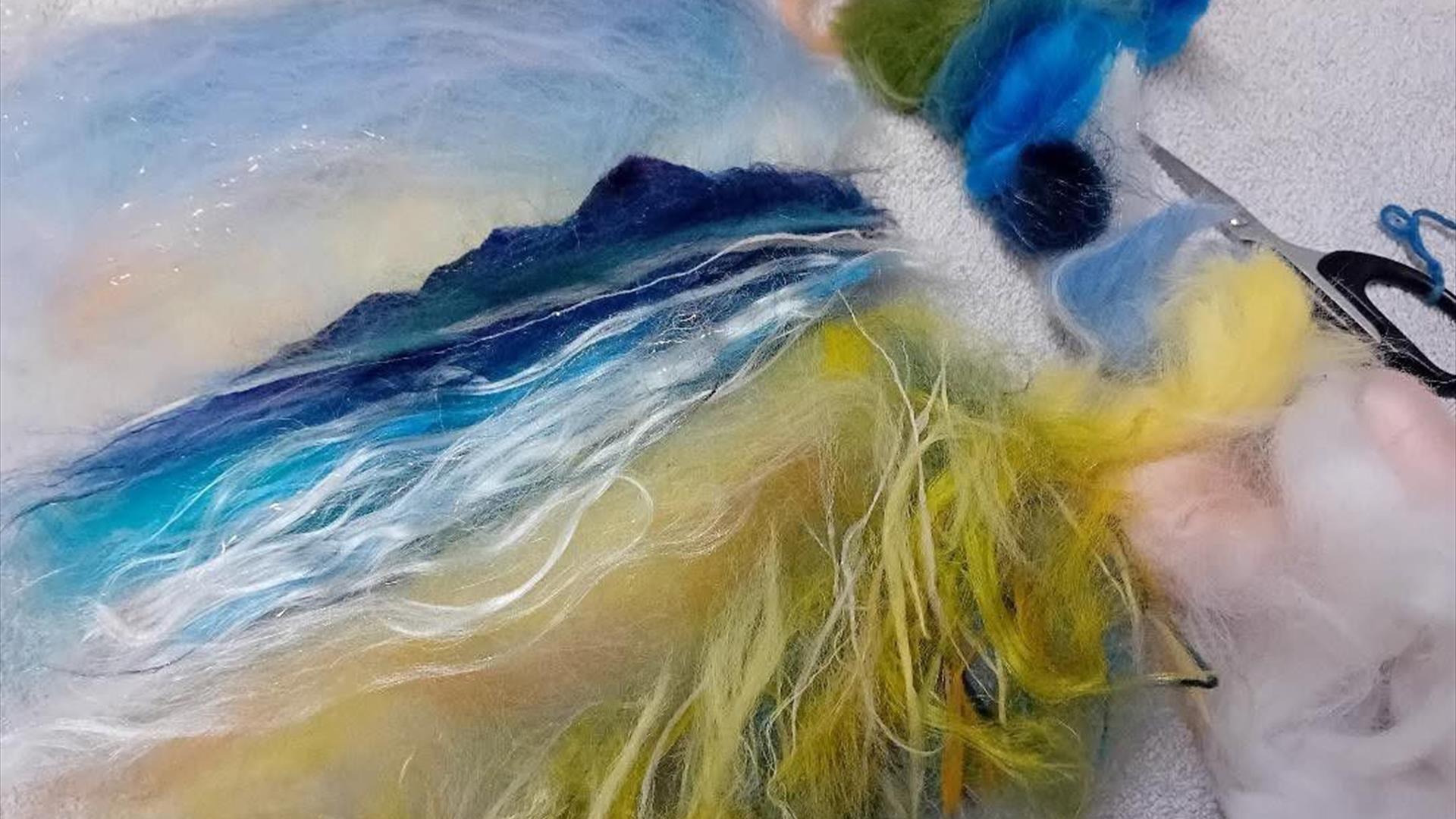 Various colourful wools ready to be felted.