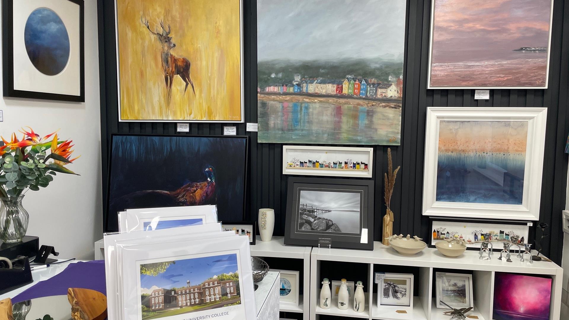 Display of various sizes of wall mounted art