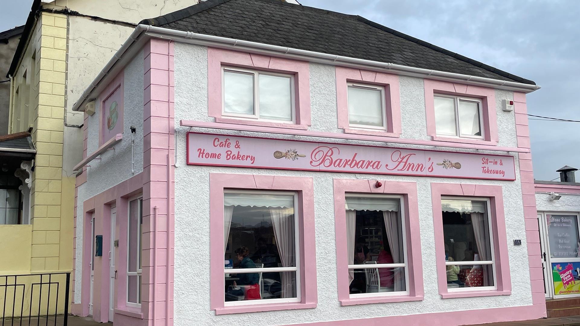 Pink and white exterior of Barbara Ann's Cafe & Bakery