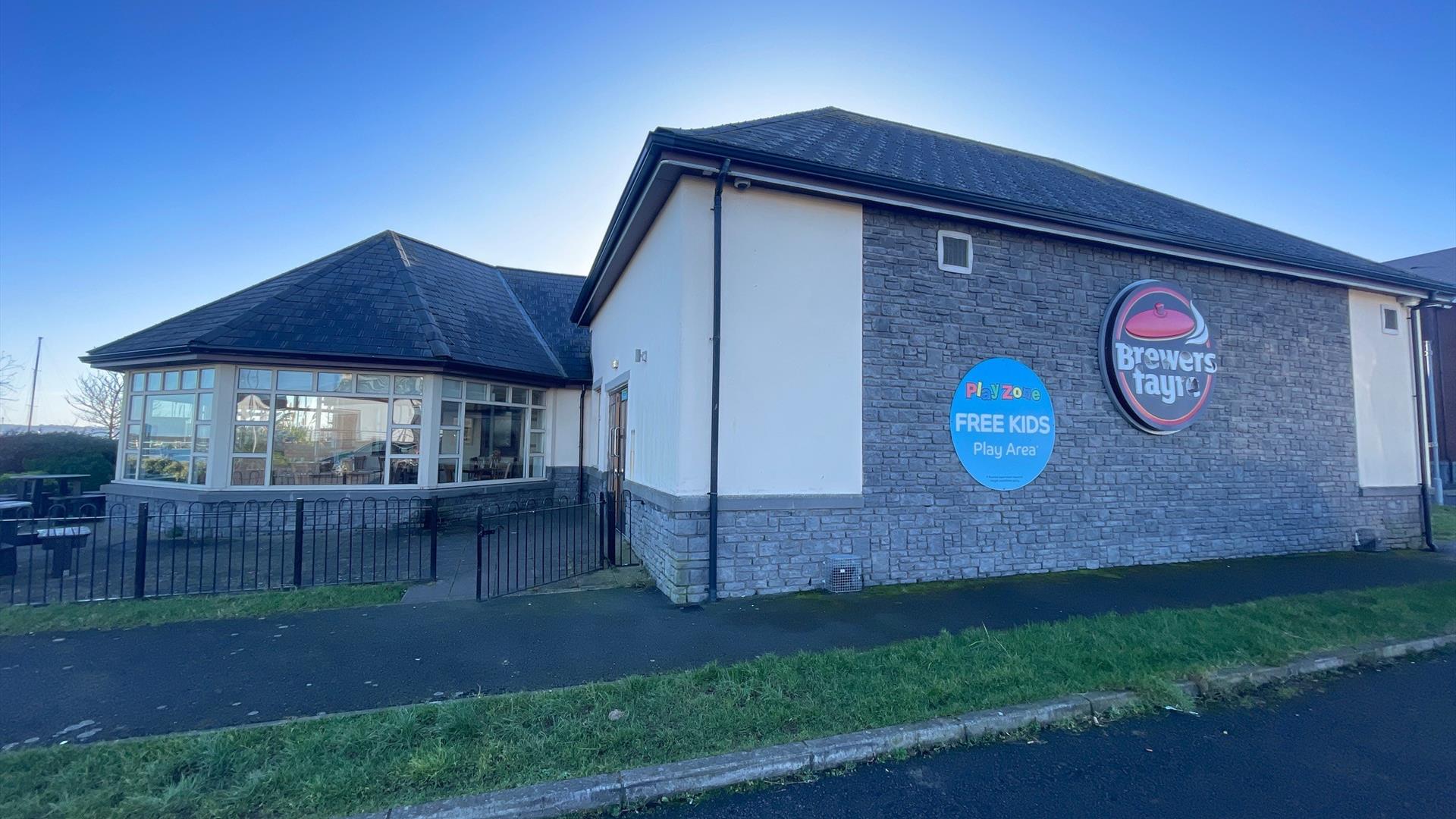 Front view of Brewers Fayre building in Carrickfergus with conservatory