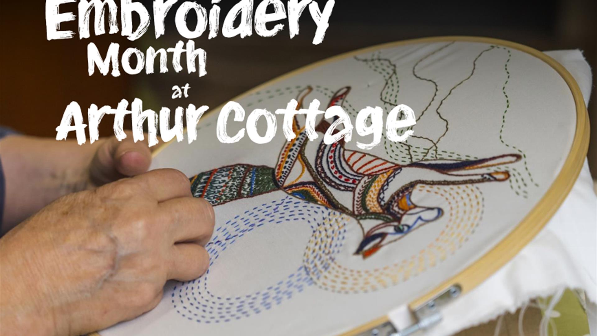 Lady stitching with colourful thread on fabric