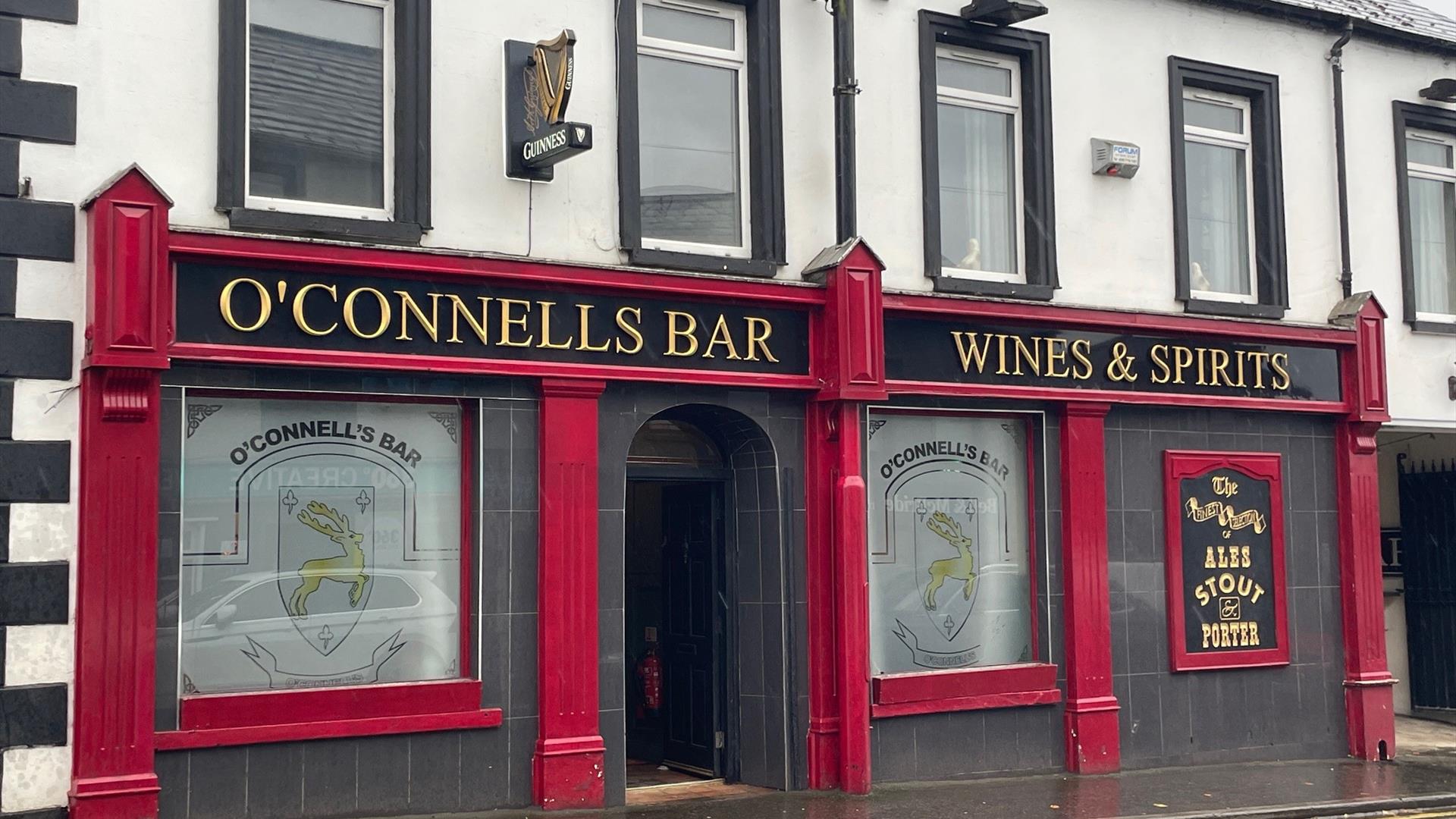 Red exterior of O'Connells Bar in Portglenone.