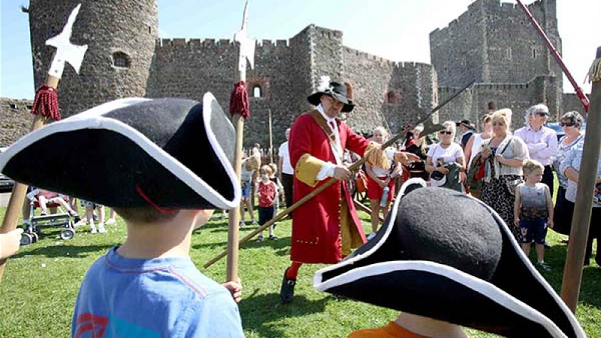 Carrickfergus Castle - crowds of kids and adults in period costumes.