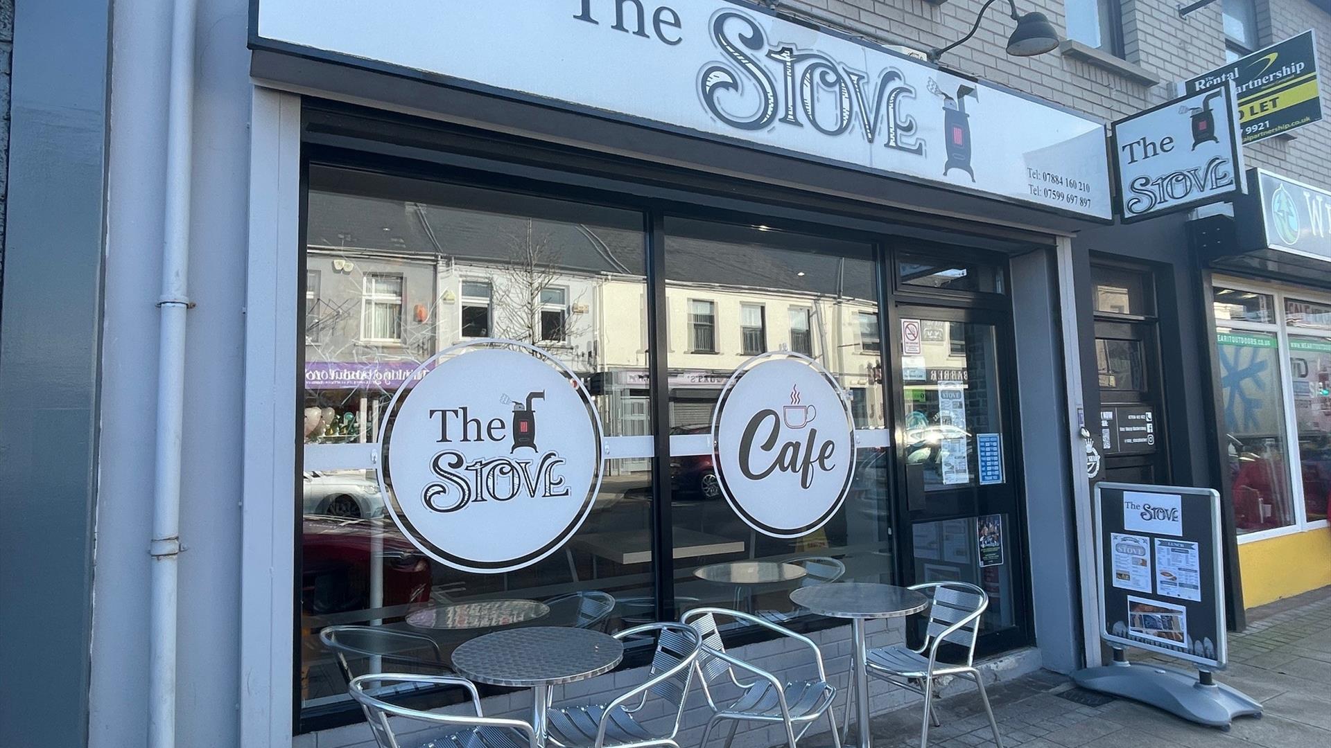 Exterior of The Stove in Larne with seats outside