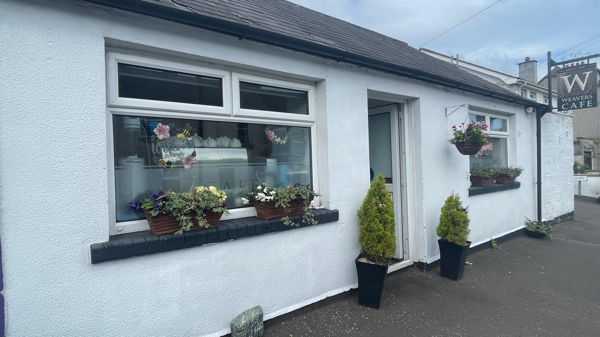 White cottage style exterior of Weavers Cafe in Ballycarry