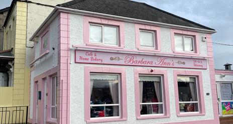 Pink and white exterior of Barbara Ann's Cafe & Bakery