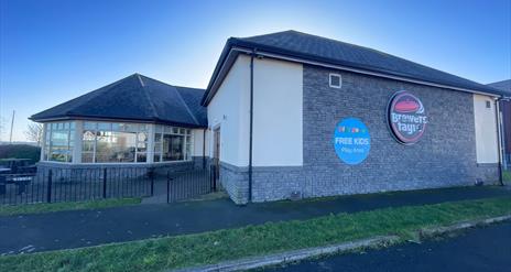 Front view of Brewers Fayre building in Carrickfergus with conservatory