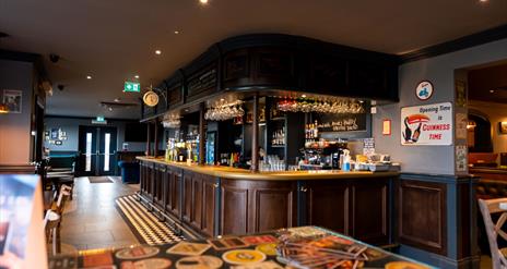 Rustic wooden panelled bar