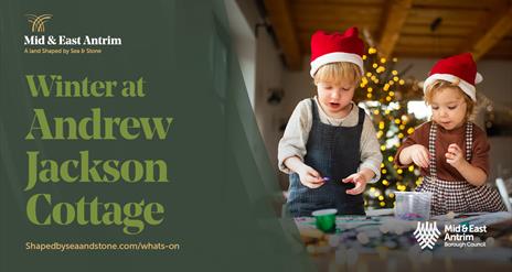 Two children making christmas decorations