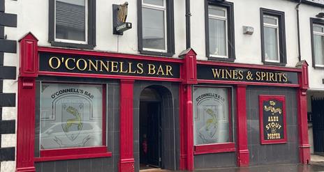 Red exterior of O'Connells Bar in Portglenone.