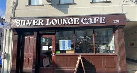 Brown panelled exterior of Silver Lounce Cafe in Larne