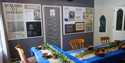 Interpretation panels on wall relating to Dobbins history in Carrickfergus