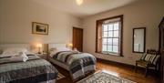 Bedroom with two single beds.
