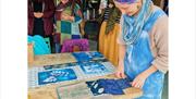 Cyanotype artist prepares materials