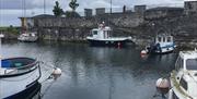 Small fishing boat Amberjack moored in Carnlough Harbour