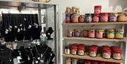 Free standing display with jewellery and shelves with home made jam