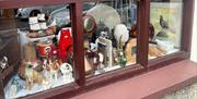 Window display of vintage and antique items