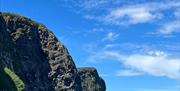 View of Gobbins Cliff Path from the sea onboard Charter NI Boat