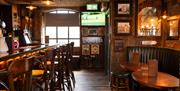 the bar area with stools