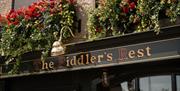 Image of the front of the bar with florals