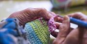 Hand crocheting at one of the classes in Lighthouse Yarns