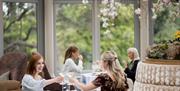 Afternoon Tea served in The Conservatory at Galgorm, overlooking the River Maine