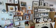 Shelf displays of arts and craft items for sale