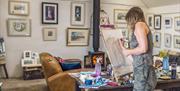 Audrey Kyle demonstrating a watercolour painting at Gobbins Studio , Islandmagee