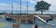 Marine Gardens Play Park with pirate ship featuring tube slide