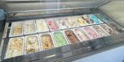 Ice cream display unit with range of flavours in tubs