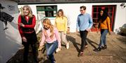 Group arriving to participate in the jewellery making workshop with Gobbins Crafts in Islandmagee