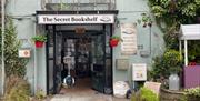 Exterior of Secret Bookshelf shop at the rear of the Courtyard Complex