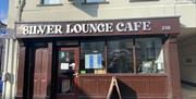 Brown panelled exterior of Silver Lounce Cafe in Larne