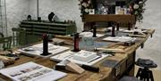 Table set up with equipment for jewellery making class at Vera McCullough's