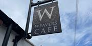 Weavers Cafe hanging sign in Ballycarry