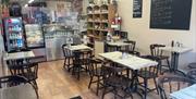 Seating area, counter and drinks display in the Wee Cafe, Larne