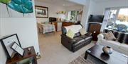 The kitchen/dining area pictured from the front door, revealling the space available.