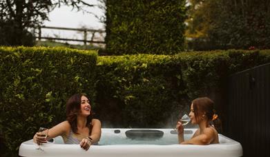 Private outdoor hot tub at Charles Lanyon Lodge, Galgorm