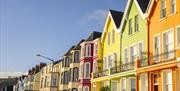 Coloured houses on Whitehead Promenade