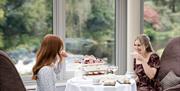 Afternoon Tea served in The Conservatory at Galgorm, overlooking the River Maine