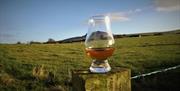 A glass of Ulster Whiskey