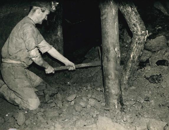 A miner extracting bauxite at Lyle Hill, Templepatrick, c1945 (Larne Museum Archives)