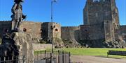 Carrickfergus Castle with King William statue